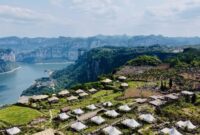 Pictured: A mountain-clinging homestay and camping base in Huawu Village, Qianxi, Bijie, Guizhou, China.